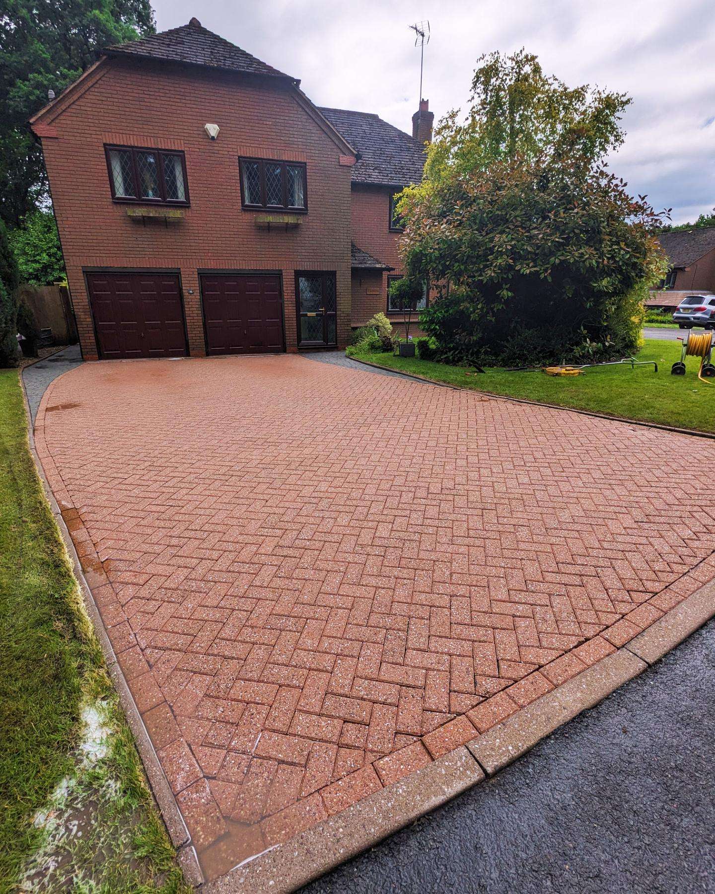 Block paving after jet washing - vibrant restored driveway